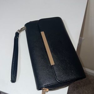 Used black wristlet wallet/ clutch